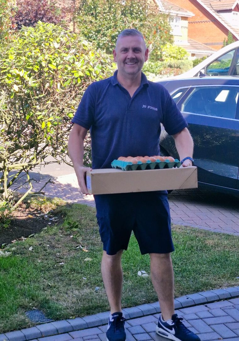 Jon Green delivering fresh eggs from his JG Foods van